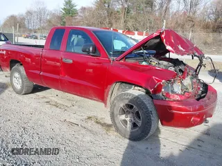 2006 Dodge Dakota SLT with VIN 1D7HW42N16S525329, listed as a IAAI auction lot 40920101 with 124,535 mi miles and . Bid and sale history available at carsss.com. Image 1.