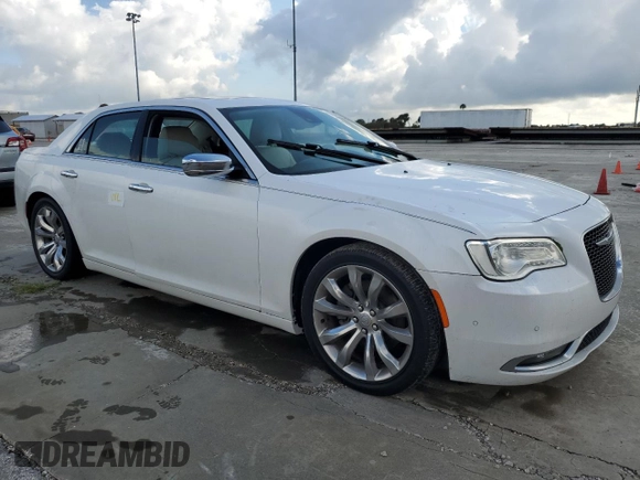 2015 Chrysler 300 C with VIN 2C3CCAET3FH830414, listed as a Copart auction lot 73649014 with Not Provided miles and Salvage Title. Bid and sale history available at DreamBid. Image 4.