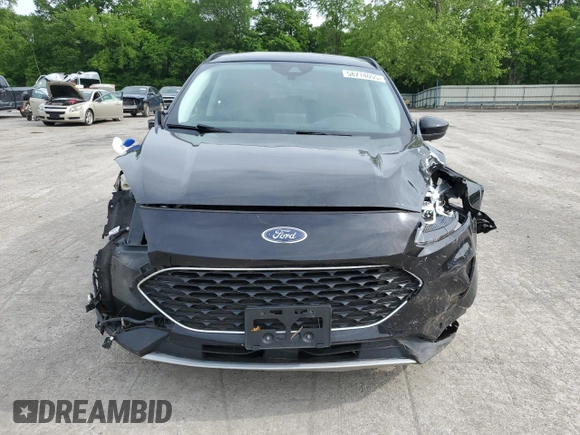2021 Ford Escape Titanium with VIN 1FMCU9J97MUA57521, listed as a Copart auction lot 58714055 with 83,201 mi miles and Salvage title. Bid and sale history available at DreamBid. Image 5.