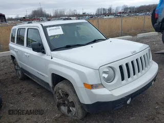 2016 Jeep Patriot High Altitude Edition with VIN 1C4NJRFB9GD808902, listed as a IAAI auction lot 41919059 with 123,265 mi miles. Bid and sale history available at carsss.com. Image 1.