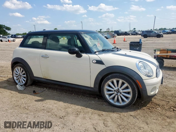 2010 MINI Hardtop with VIN WMWMF3C50ATZ61512, listed as a Copart auction lot 57819095 with 150,848 mi miles and Clean title. Bid and sale history available at DreamBid. Image 4.