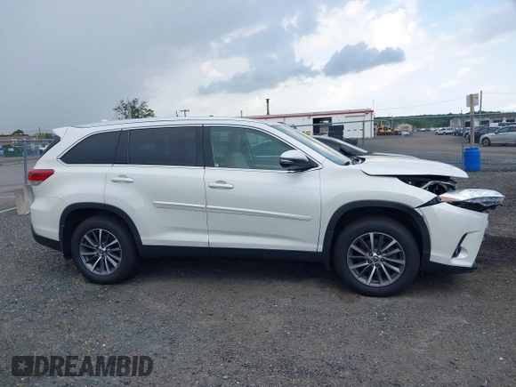 2019 Toyota Highlander SE with VIN 5TDJZRFH1KS567376, listed as a IAAI auction lot 42728105 with 58,970 mi miles and . Bid and sale history available at DreamBid. Image 13.