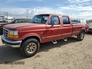 1997 Ford F-350 with VIN 1FTJW35F6VEC77988, listed as a Copart auction lot 69085154 with 261,172 mi miles and Salvage Title. Bid and sale history available at DreamBid. Image 1.