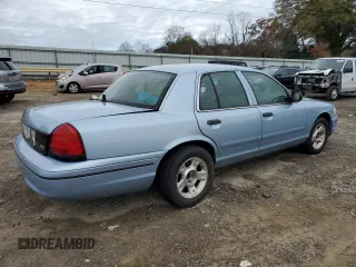 2001 Ford Crown Victoria Police Police Interceptor with VIN 2FAFP71W61X161009, listed as a Copart auction lot 81355274 with 85,072 mi miles and Salvage Title. Bid and sale history available at carsss.com. Image 3.