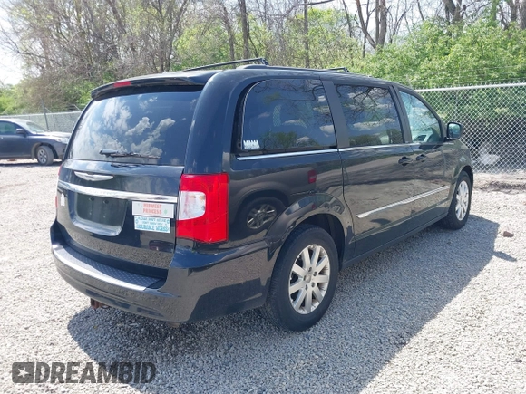 2013 Chrysler Town & Country Touring with VIN 2C4RC1BG1DR662485, listed as a IAAI auction lot 42109856 with 153,277 mi miles. Bid and sale history available at carsss.com. Image 4.