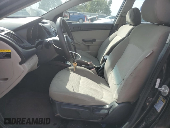 2013 Kia Forte LX with VIN KNAFT4A21D5738520, listed as a Copart auction lot 70834404 with 246,902 mi miles and Salvage Title. Bid and sale history available at carsss.com. Image 7.