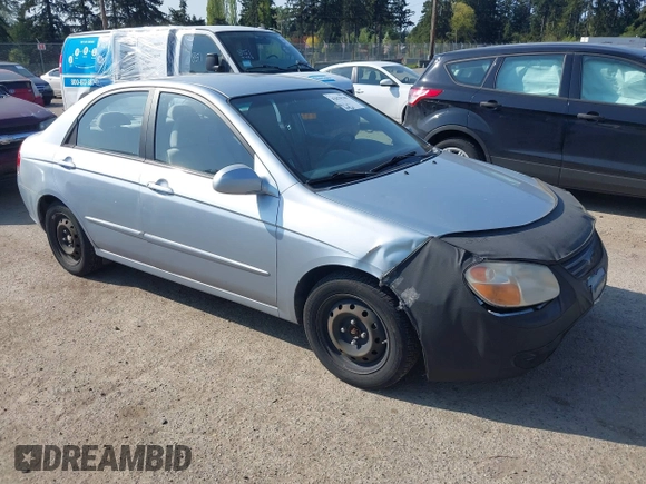 2007 Kia Spectra EX with VIN KNAFE121175389331, listed as a IAAI auction lot 42078709 with 199,324 mi miles. Bid and sale history available at carsss.com. Image 1.