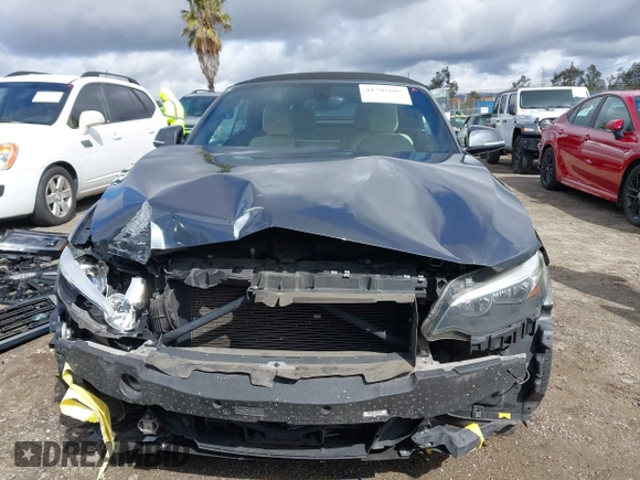 2016 BMW 2 Series 228i xDrive with VIN WBA1L9C5XGV767324, listed as a IAAI auction lot 41795604 with 133,276 mi miles. Bid and sale history available at carsss.com. Image 12.