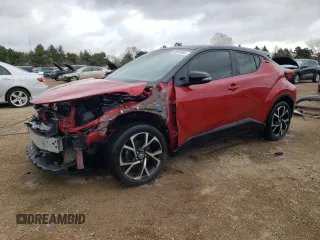 2020 Toyota C-HR LE z VIN JTNKHMBX1L1070913, wystawiony jako Copart lot #52588385 z przebiegiem 83 121 mil mil oraz Szkoda całkowita • Salvage title. Historia ofert i sprzedaży dostępna na DreamBid. Obrazek 1.
