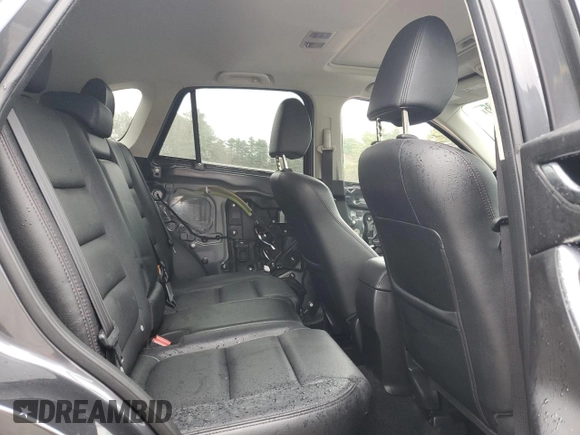 2016 Mazda CX-5 Grand Touring with VIN JM3KE4DY6G0834583, listed as a Copart auction lot 52015905 with 184,741 mi miles and Salvage Title. Bid and sale history available at DreamBid. Image 11.