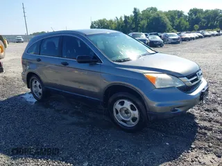 2010 Honda CR-V LX with VIN JHLRE4H33AC002519, listed as a IAAI auction lot 42577053 with 290,435 mi miles and . Bid and sale history available at DreamBid. Image 1.