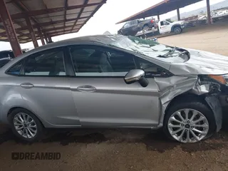 2014 Ford Fiesta SE with VIN 3FADP4BJ9EM196038, listed as a IAAI auction lot 41916159 with 85,582 mi miles. Bid and sale history available at carsss.com. Image 13.