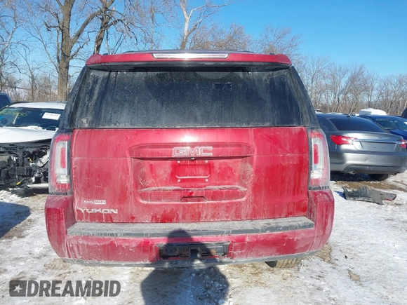 2015 GMC Yukon SLE with VIN 1GKS2AKC2FR514005, listed as a IAAI auction lot 41292783 with 129,413 mi miles. Bid and sale history available at carsss.com. Image 16.