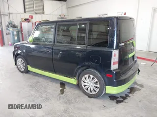 2006 Scion xB with VIN JTLKT324464098389, listed as a IAAI auction lot 41874286 with 292,051 mi miles. Bid and sale history available at carsss.com. Image 3.
