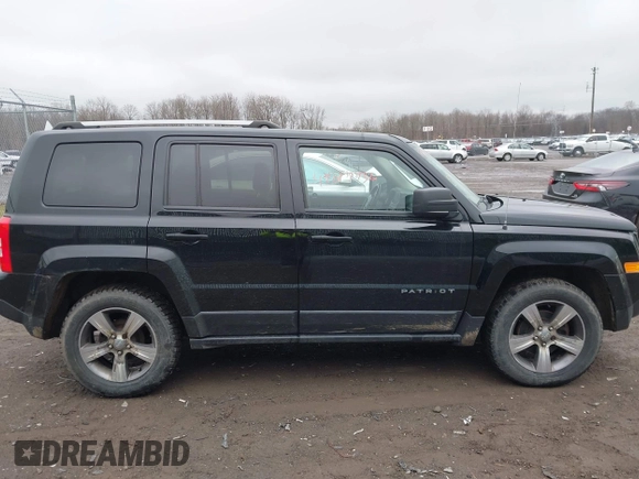 2016 Jeep Patriot Latitude with VIN 1C4NJRFB1GD523904, listed as a IAAI auction lot 42017736 with 164,705 mi miles. Bid and sale history available at carsss.com. Image 13.