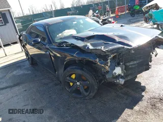 2013 Dodge Challenger R/T with VIN 2C3CDYBT8DH604893, listed as a IAAI auction lot 41585963 with 62,653 mi miles. Bid and sale history available at carsss.com. Image 1.