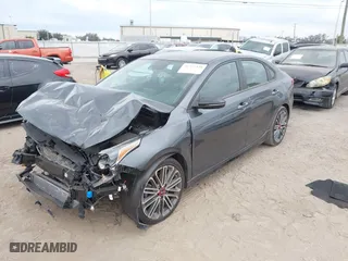 2021 Kia Forte GT with VIN 3KPF44AC7ME379056, listed as a IAAI auction lot 41357328 with 47,068 mi miles. Bid and sale history available at carsss.com. Image 20.