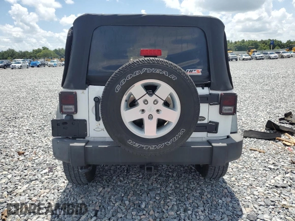 2012 Jeep Wrangler Unlimited Sport with VIN 1C4BJWDG6CL240673, listed as a Copart auction lot 60669625 with Not provided miles and Salvage title. Bid and sale history available at DreamBid. Image 6.