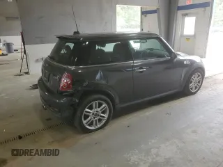 2013 MINI Hardtop S with VIN WMWSV3C57DT396593, listed as a Copart auction lot 53610125 with 116,193 mi miles and Salvage Title. Bid and sale history available at DreamBid. Image 3.