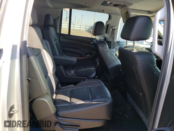 2017 Chevrolet Suburban Premier with VIN 1GNSKJKC4HR316953, listed as a Copart auction lot 76944884 with 105,753 mi miles and Salvage Title. Bid and sale history available at DreamBid. Image 11.