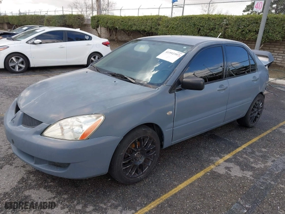 2004 Mitsubishi Lancer ES with VIN JA3AJ26E54U054570, listed as a IAAI auction lot 41592397 with 220,140 mi miles. Bid and sale history available at carsss.com. Image 17.