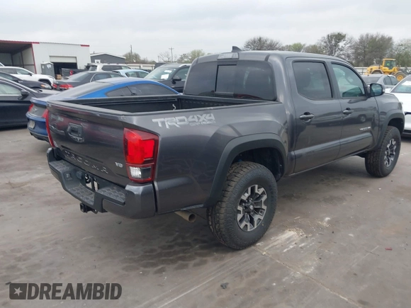 2018 Toyota Tacoma SR with VIN 5TFCZ5AN6JX127774, listed as a IAAI auction lot 41801158 with 28,161 mi miles and . Bid and sale history available at DreamBid. Image 4.