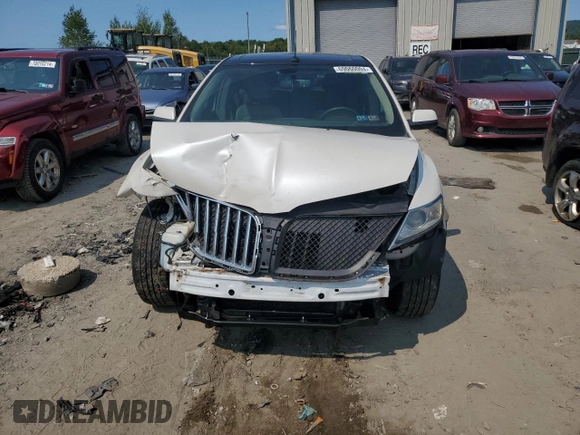 2011 Lincoln MKX with VIN 2LMDJ8JK3BBJ33995, listed as a Copart auction lot 69060004 with 188,962 mi miles and Salvage Title. Bid and sale history available at DreamBid. Image 5.