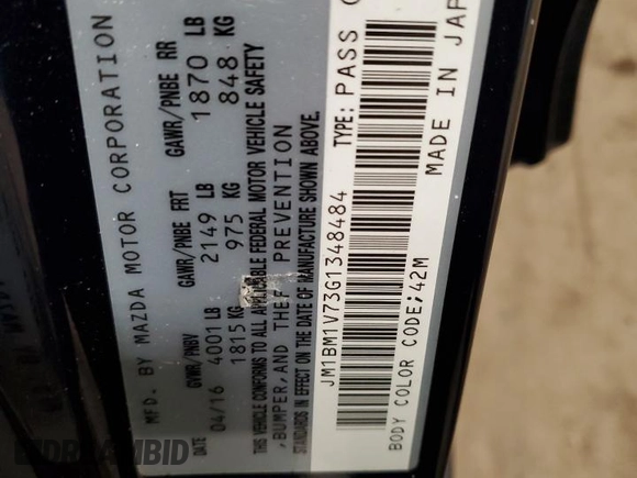 2016 Mazda 3 i Touring z VIN JM1BM1V73G1348484, wystawiony jako Copart lot #60684625 z przebiegiem 58 770 mil mil oraz Szkoda całkowita • Salvage title. Historia ofert i sprzedaży dostępna na DreamBid. Obrazek 12.