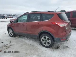 2016 Ford Escape SE with VIN 1FMCU9GX1GUC40696, listed as a Copart auction lot 42333485 with 167,901 mi miles and Clean Title. Bid and sale history available at DreamBid. Image 2.