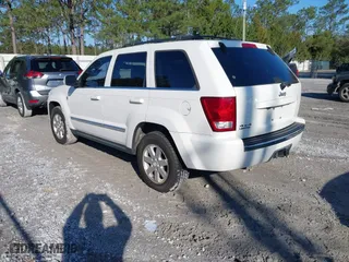 2009 Jeep Grand Cherokee Limited with VIN 1J8HR58P89C513900, listed as a IAAI auction lot 41615957 with 152,119 mi miles. Bid and sale history available at carsss.com. Image 3.