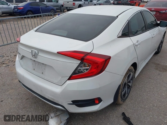 2020 Honda Civic LX with VIN 19XFC2F62LE021811, listed as a IAAI auction lot 41591466 with 75,797 mi miles and . Bid and sale history available at DreamBid. Image 4.