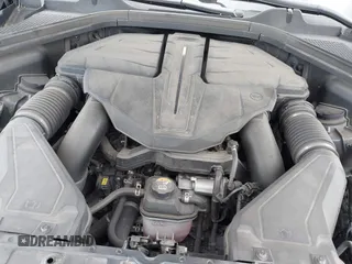 2023 Genesis GV80 with VIN KMUHCESC1PU140766, listed as a IAAI auction lot 42001879 with 67,050 mi miles. Bid and sale history available at carsss.com. Image 10.