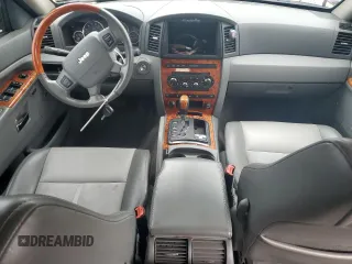 2007 Jeep Grand Cherokee Overland with VIN 1J8HR68227C651830, listed as a Copart auction lot 62403725 with 147,827 mi miles and Salvage title. Bid and sale history available at DreamBid. Image 8.