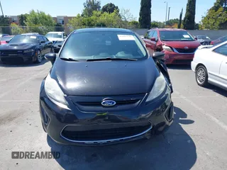2011 Ford Fiesta SES with VIN 3FADP4FJ9BM181965, listed as a IAAI auction lot 42092140 with 150,304 mi miles. Bid and sale history available at carsss.com. Image 13.