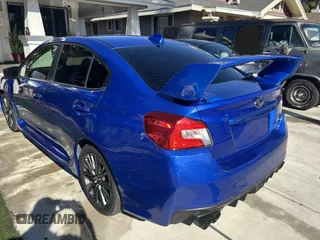 2020 Subaru WRX with VIN JF1VA1A66L9833254, listed as a IAAI auction lot 41371043 with 120,296 mi miles. Bid and sale history available at carsss.com. Image 3.