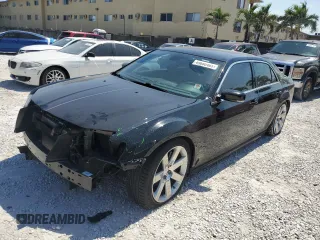 2012 Chrysler 300 SRT8 with VIN 2C3CCAFJXCH800724, listed as a Copart auction lot 49680465 with 87,279 mi miles and Salvage Title. Bid and sale history available at carsss.com. Image 1.
