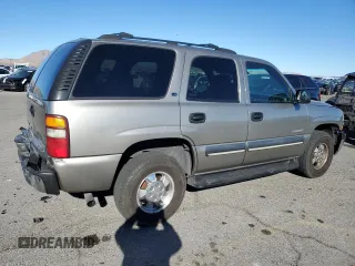 2002 Chevrolet Tahoe LS with VIN 1GNEC13V82R153063, listed as a Copart auction lot 84180594 with 148,190 mi miles and Salvage Title. Bid and sale history available at carsss.com. Image 3.