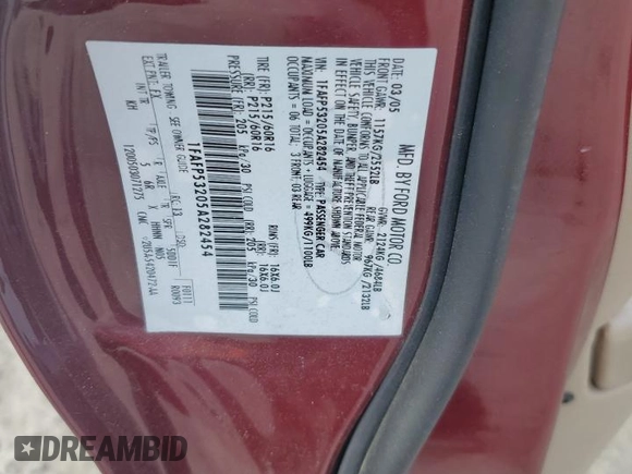 2005 Ford Taurus SE with VIN 1FAFP53205A282454, listed as a Copart auction lot 51052425 with 116,706 mi miles and Salvage Title. Bid and sale history available at carsss.com. Image 12.