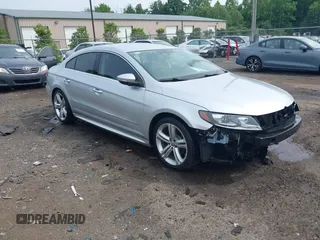 2014 Volkswagen CC Sport z VIN WVWBN7AN9EE524674, wystawiony jako IAAI lot #42252264 z przebiegiem 118 378 mil mil oraz . Historia ofert i sprzedaży dostępna na DreamBid. Obrazek 1.