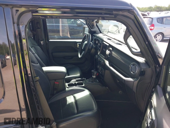 2022 Jeep Wrangler Unlimited Sahara with VIN 1C4JJXP60NW153776, listed as a IAAI auction lot 42108916 with 39,123 mi miles and . Bid and sale history available at DreamBid. Image 5.