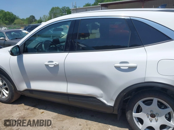 2020 Ford Escape SE z VIN 1FMCU9G63LUA85246, wystawiony jako IAAI lot #42414015 z przebiegiem 54 578 mil mil oraz . Historia ofert i sprzedaży dostępna na DreamBid. Obrazek 15.