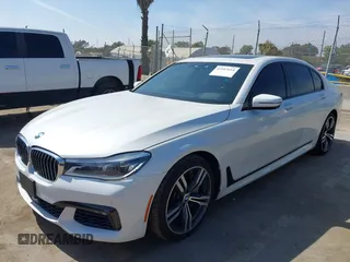 2019 BMW 7 Series 750i with VIN WBA7F0C5XKGM25771, listed as a IAAI auction lot 42167614 with 73,692 mi miles. Bid and sale history available at carsss.com. Image 17.