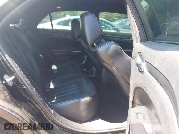 2015 Chrysler 300 with VIN 2C3CCABG1FH807740, listed as a IAAI auction lot 40246268 with 174,037 mi miles. Bid and sale history available at carsss.com. Image 8.