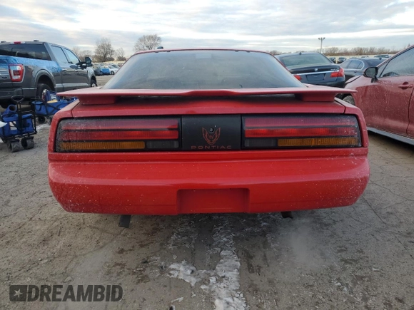1991 Pontiac Firebird with VIN 1G2FS23E5ML200758, listed as a Copart auction lot 84013464 with 156,810 mi miles and Salvage title. Bid and sale history available at DreamBid. Image 6.