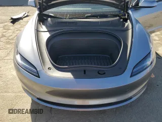2025 Tesla Model 3 Long Range with VIN 5YJ3E1EA8SF890337, listed as a Copart auction lot 45023425 with 1,765 mi miles and Salvage Title. Bid and sale history available at DreamBid. Image 12.