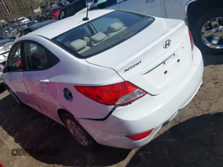 2014 Hyundai Accent GLS with VIN KMHCT4AE4EU590415, listed as a IAAI auction lot 41877817 with 169,285 mi miles. Bid and sale history available at carsss.com. Image 3.
