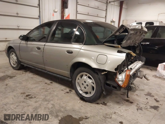 1997 Saturn SL with VIN 1G8ZH5280VZ172929, listed as a IAAI auction lot 41273214 with 134,972 mi miles. Bid and sale history available at carsss.com. Image 3.