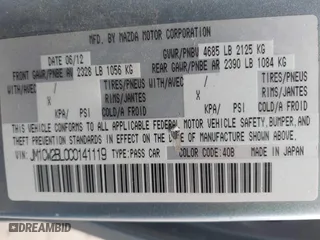 2012 Mazda Mazda5 Sport with VIN JM1CW2BL0C0141119, listed as a IAAI auction lot 42073200 with 142,805 mi miles. Bid and sale history available at carsss.com. Image 9.