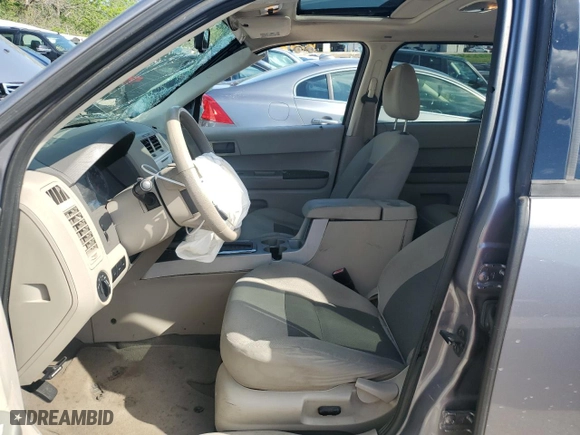 2008 Ford Escape XLT with VIN 1FMCU031X8KA77833, listed as a Copart auction lot 52677714 with 218,934 mi miles and Non Repairable. Bid and sale history available at carsss.com. Image 7.