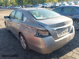 2015 Nissan Altima 2.5 with VIN 1N4AL3AP9FC115766, listed as a IAAI auction lot 41961170 with 154,820 mi miles. Bid and sale history available at carsss.com. Image 3.